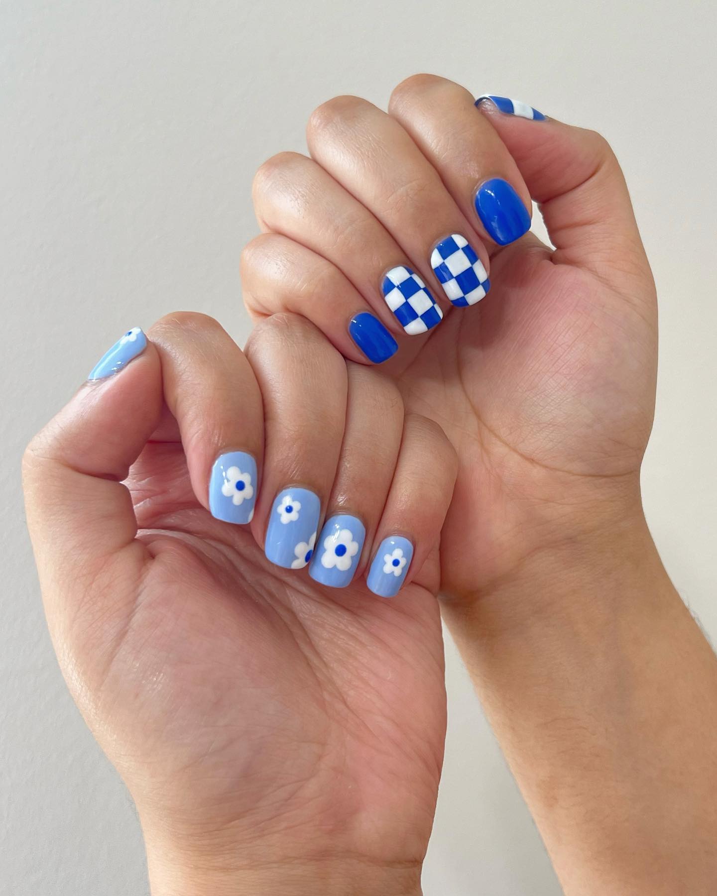 Checkerboard and floral nail design