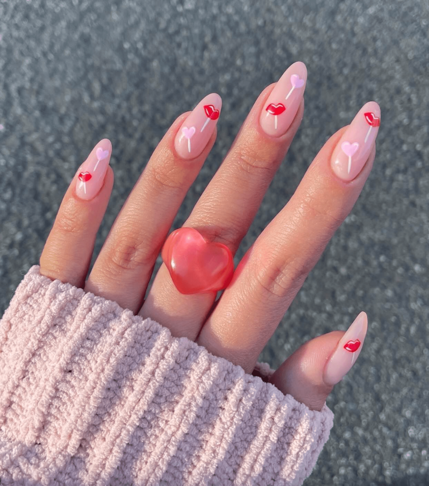 simple Valentine's Day nail designs with cute Vday nail art including red lips and pink hearts