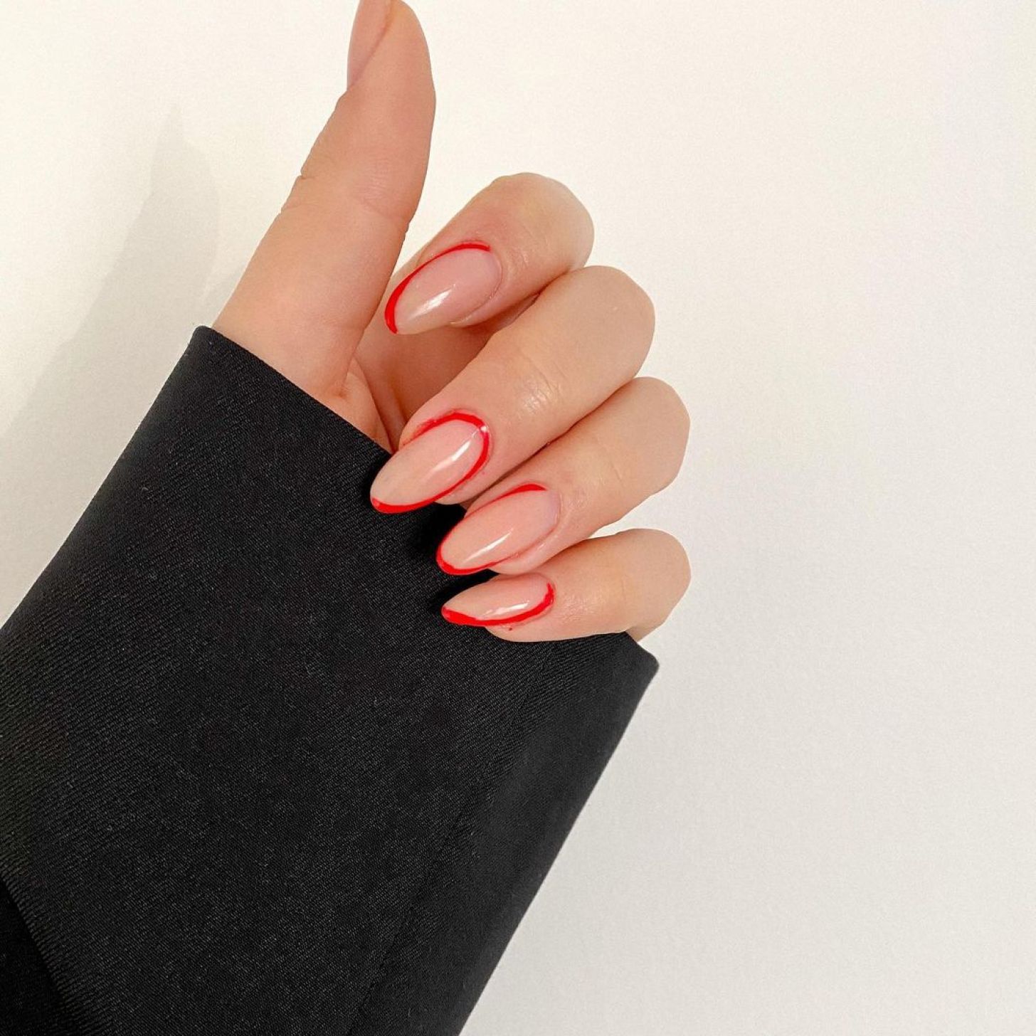 simple nude nails with red outlines